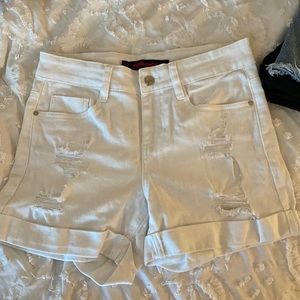 white ripped shorts